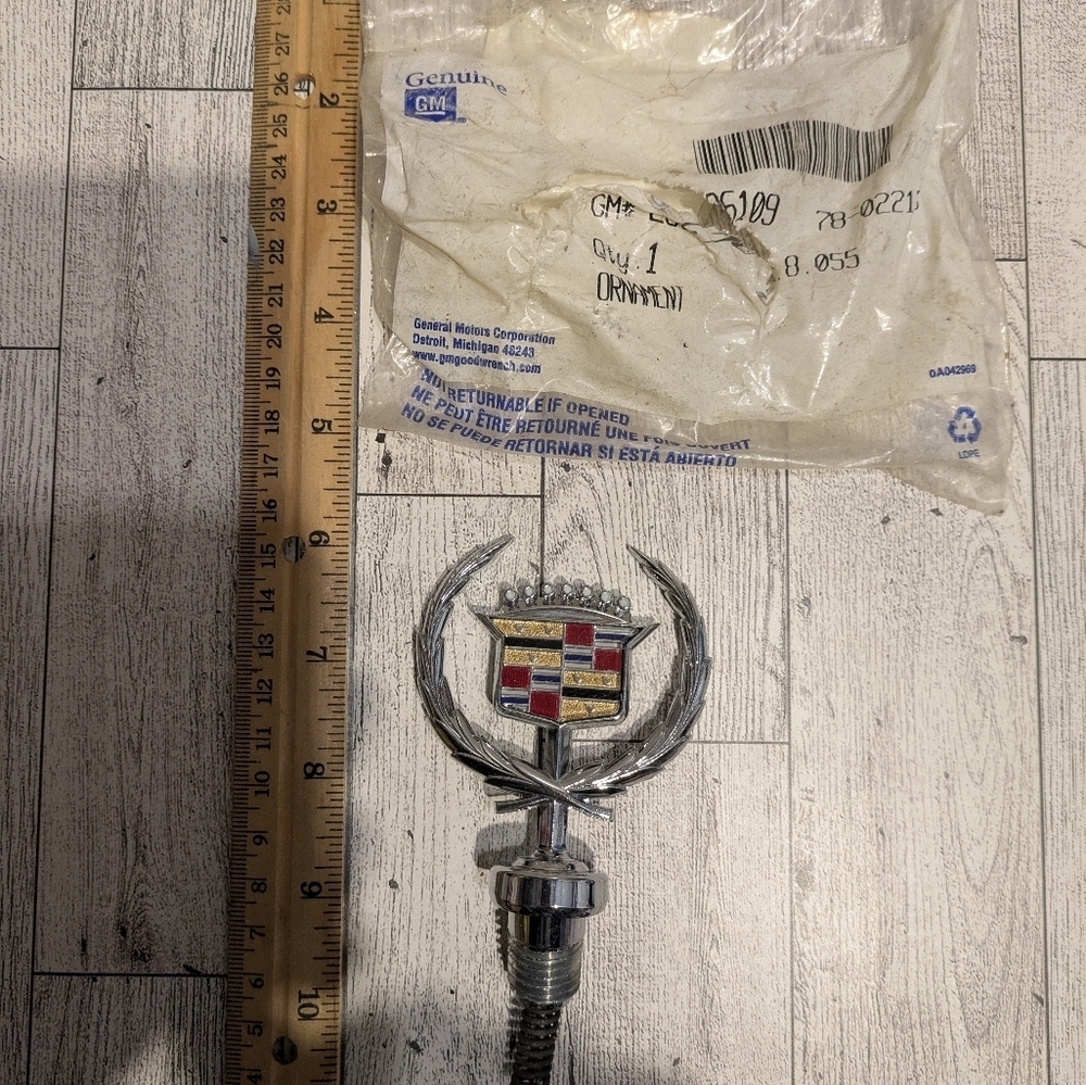 Cadillac Silver and Red Hood Ornament